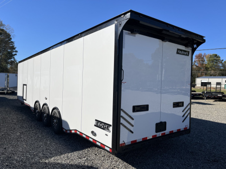 New 2026 Haulmark 34 Bathoom Race Trailer, Air Prep PKG, Awning, Polycor, Insulated, Window, 54" ALX Slide Out Step, A/C + Heat