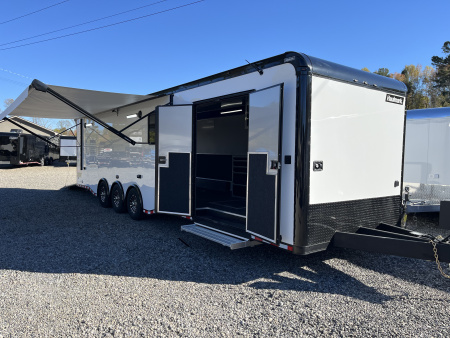 New 2026 Haulmark 34 Bathoom Race Trailer, Air Prep PKG, Awning, Polycor, Insulated, Window, 54  ALX Slide Out Step, A/C + Heat