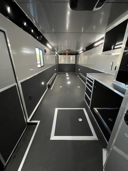 New 2026 Haulmark 34 Bathoom Race Trailer, Air Prep PKG, Awning, Polycor, Insulated, Window, 54" ALX Slide Out Step, A/C + Heat