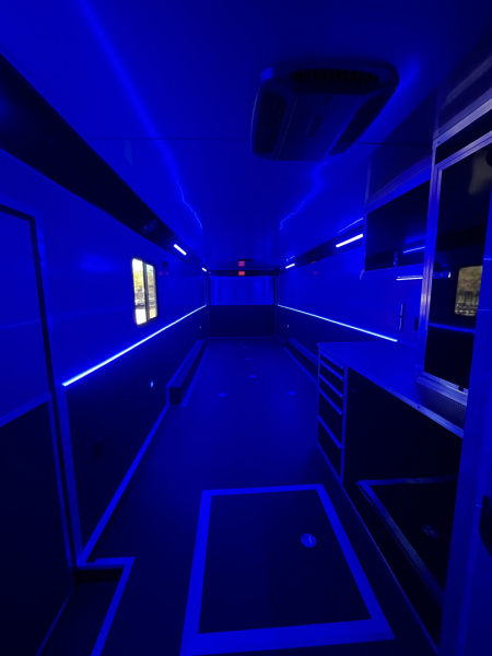 New 2026 Haulmark 34 Bathoom Race Trailer, Air Prep PKG, Awning, Polycor, Insulated, Window, 54" ALX Slide Out Step, A/C + Heat