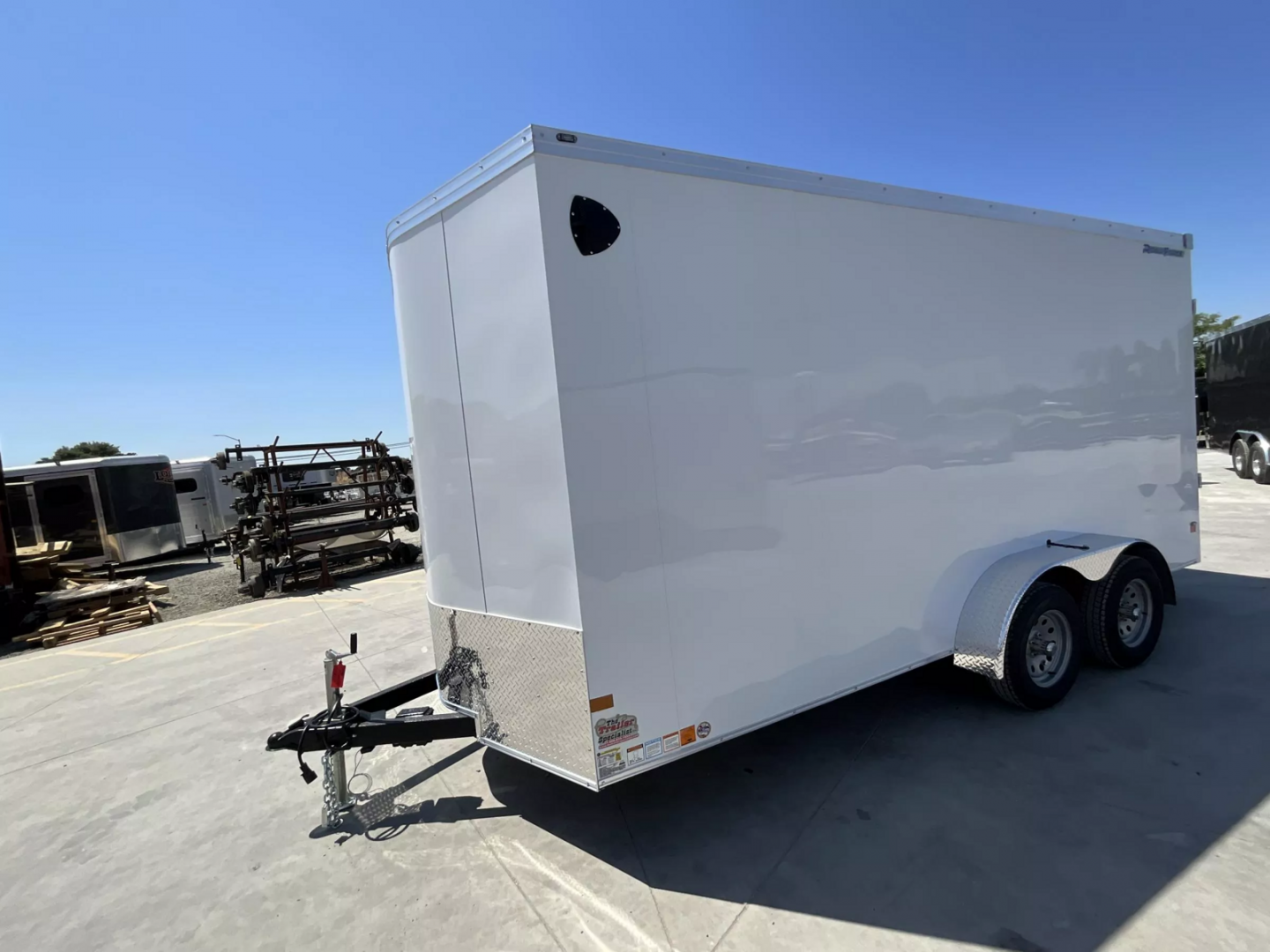 New 2025 Wells Cargo 7FT X 16FT 7K GVW TA Cargo / Enclosed Trailer
