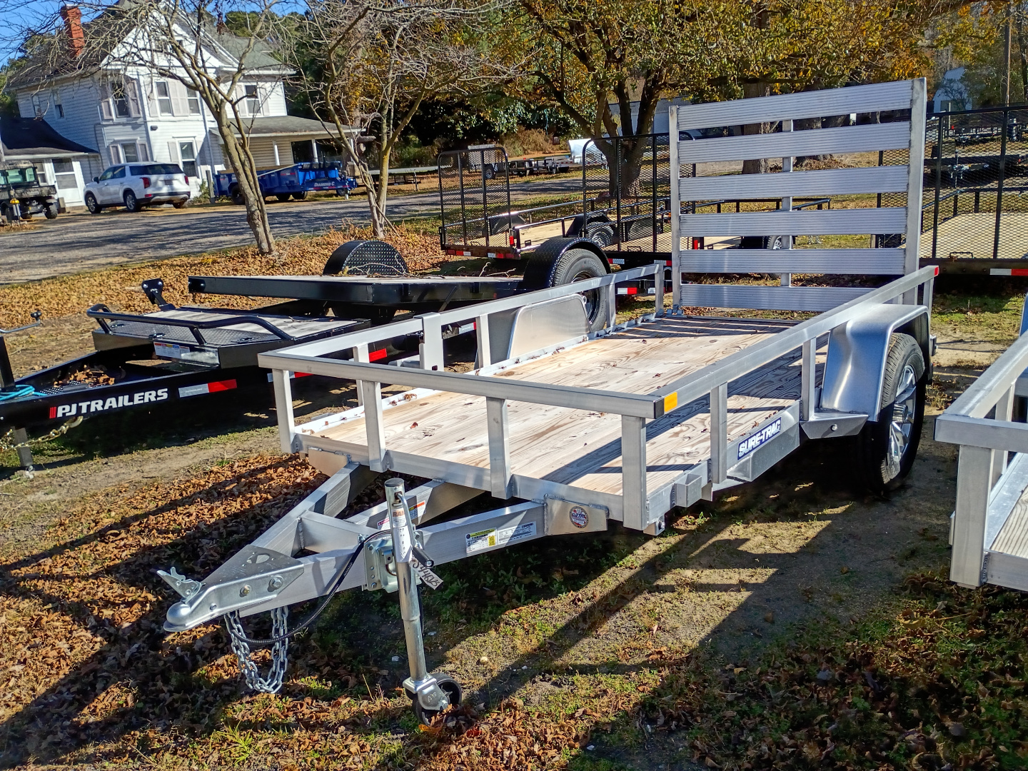 New 2025 Sure-Trac 23292 5x10 alum/wood Utility Trailer