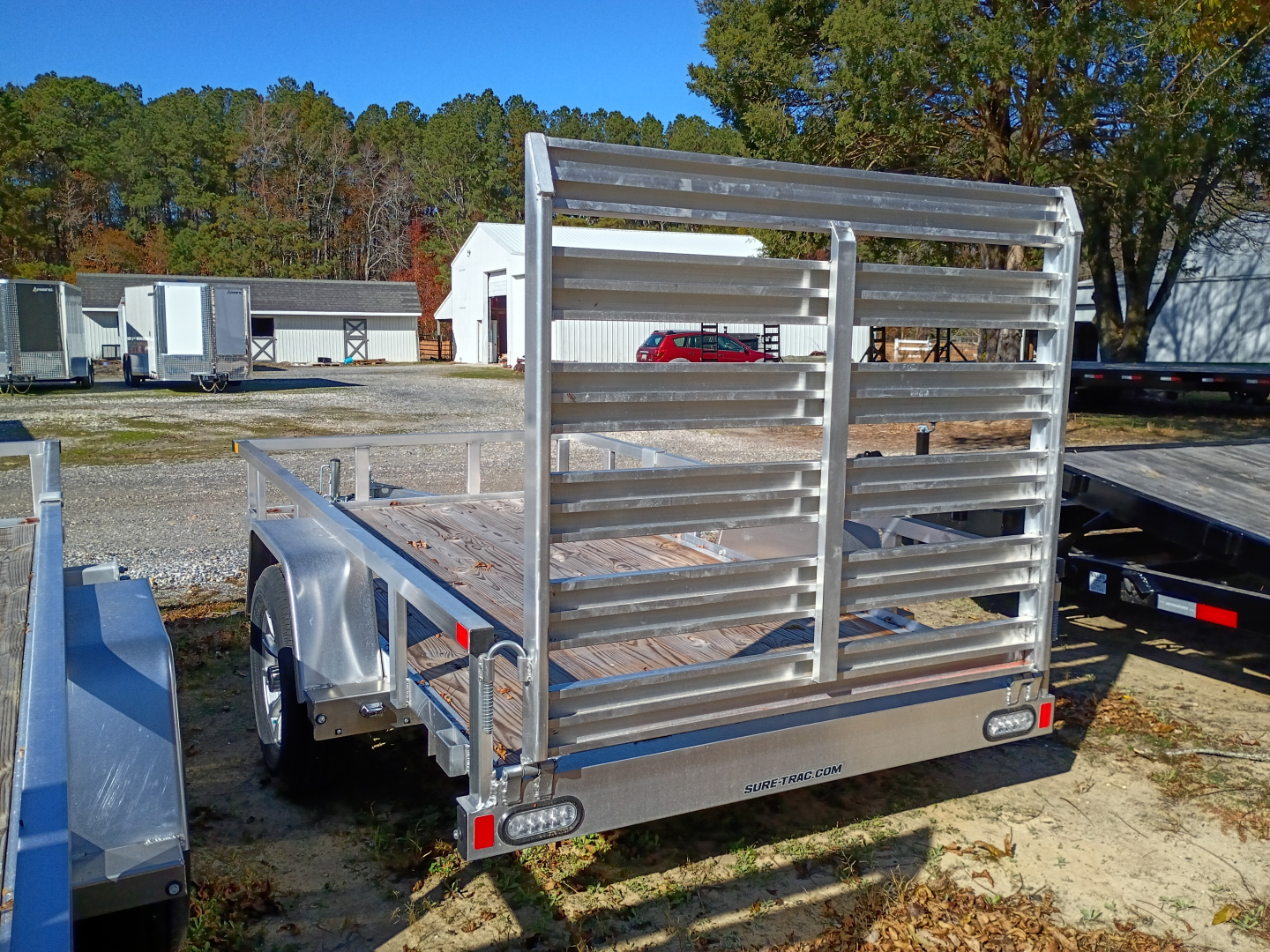 New 2025 Sure-Trac 23292 5x10 alum/wood Utility Trailer