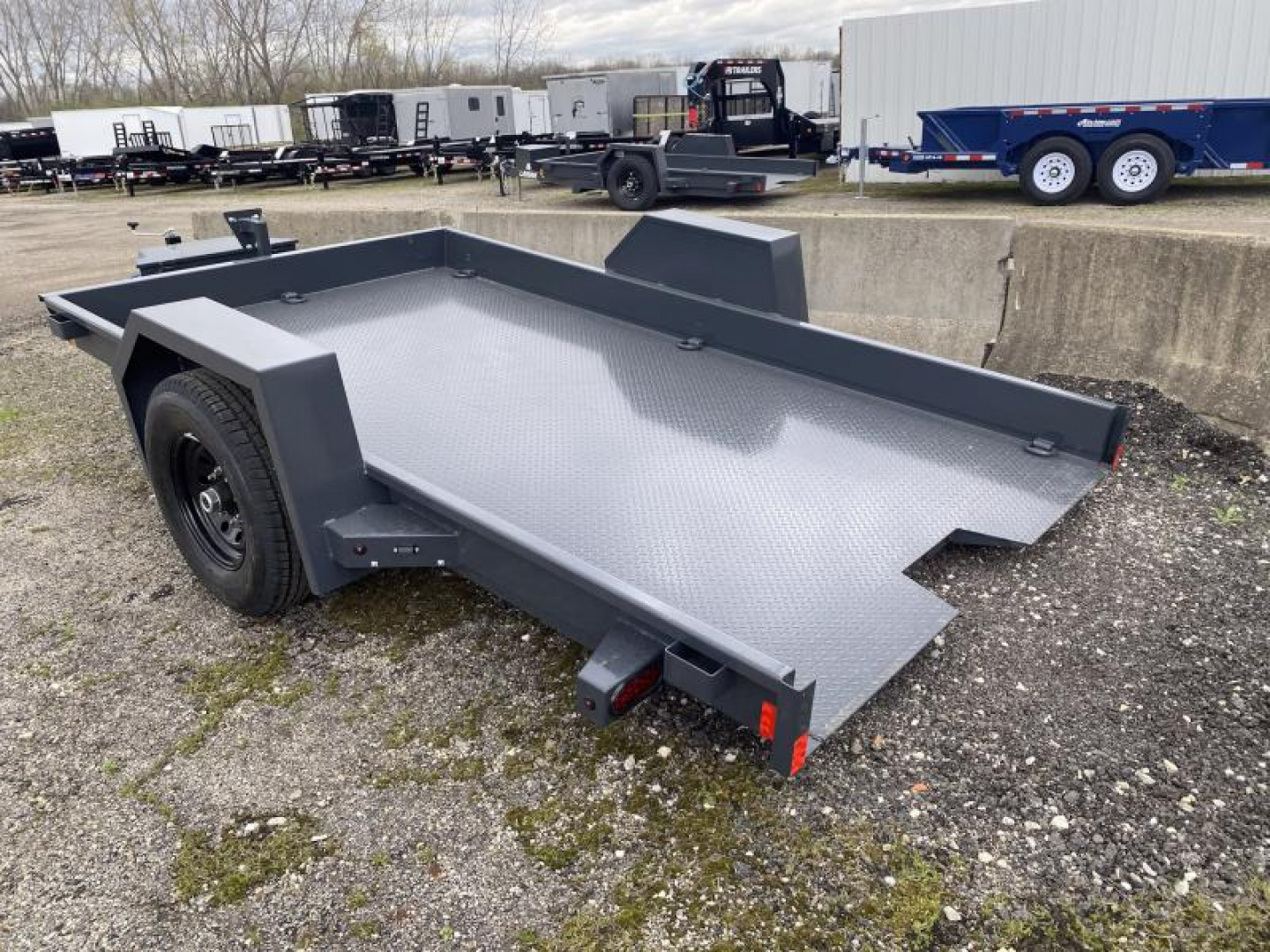New 2025 Lamar Trailers 6 FT 6 IN X 12 FT TILT TRAILER STEEL DECK 7K GVWR