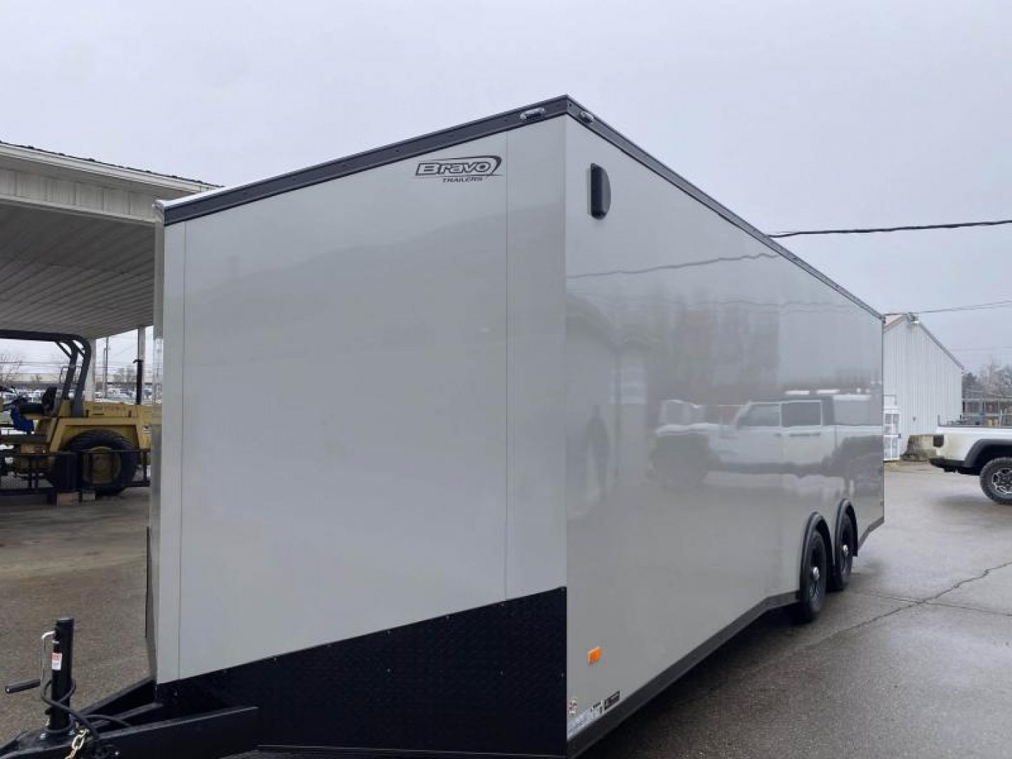 New 2025 Bravo Trailers SCOUT 24 FT ENCLOSED CAR HAULER 7 FT INT BLACK OUT TRIM 10K GVWR *FACTORY CLOSE OUT*