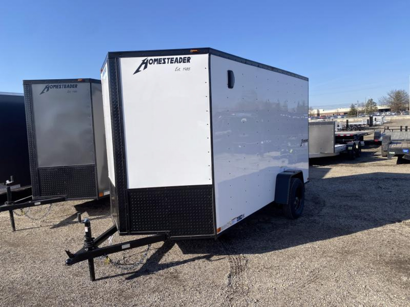 New 2025 Homesteader Trailer 6 X 12 FT CARGO TRAILER 6 FT 6 IN INT HEIGHT WITH RAMP DOOR BLACK OUT