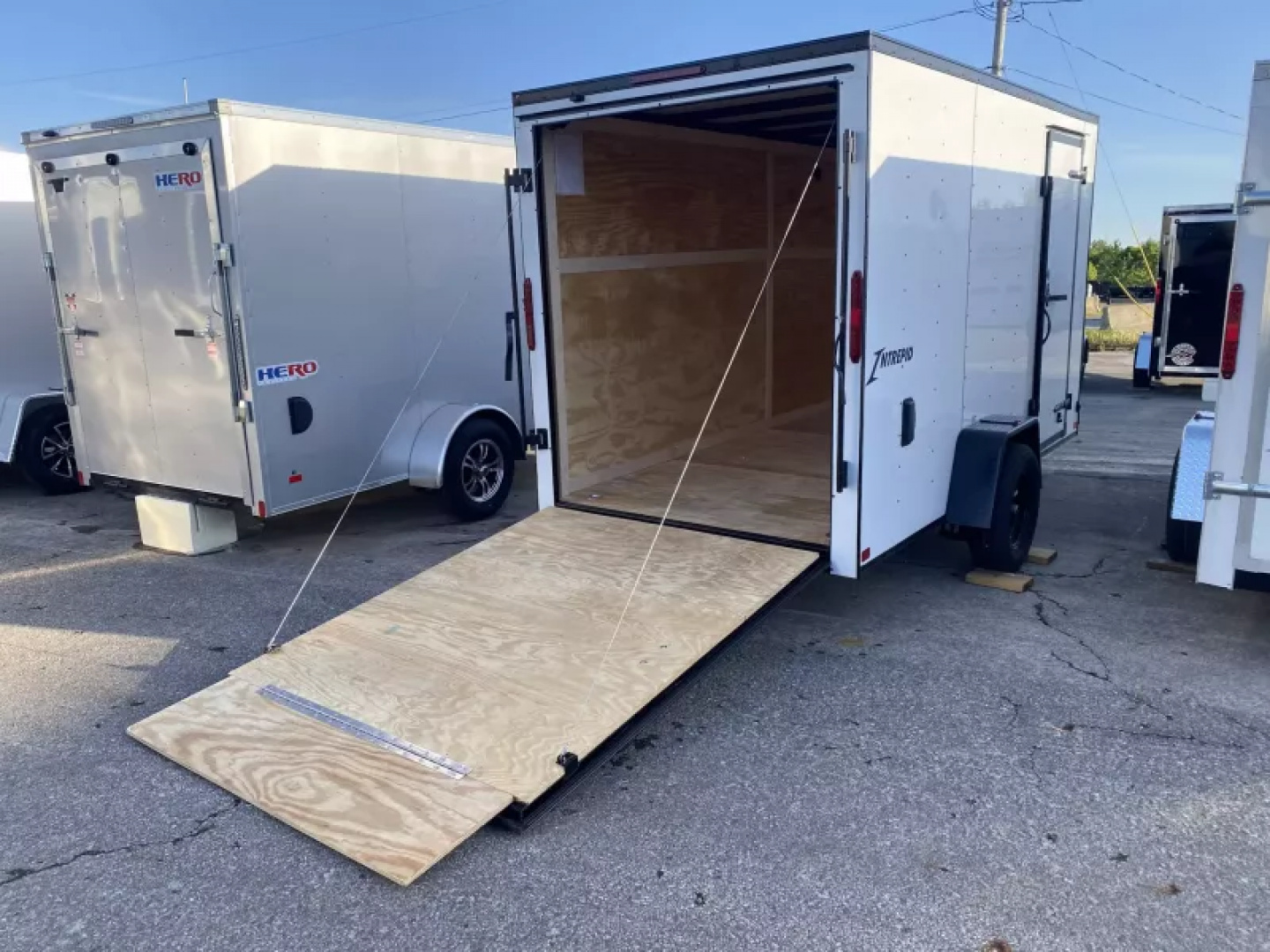 New 2025 Homesteader Trailer 6 X 12 FT CARGO TRAILER 6 FT 6 IN INT HEIGHT WITH RAMP DOOR BLACK OUT