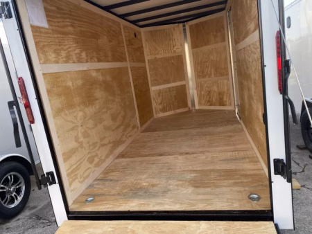 New 2025 Homesteader Trailer 6 X 12 FT CARGO TRAILER 6 FT 6 IN INT HEIGHT WITH RAMP DOOR BLACK OUT