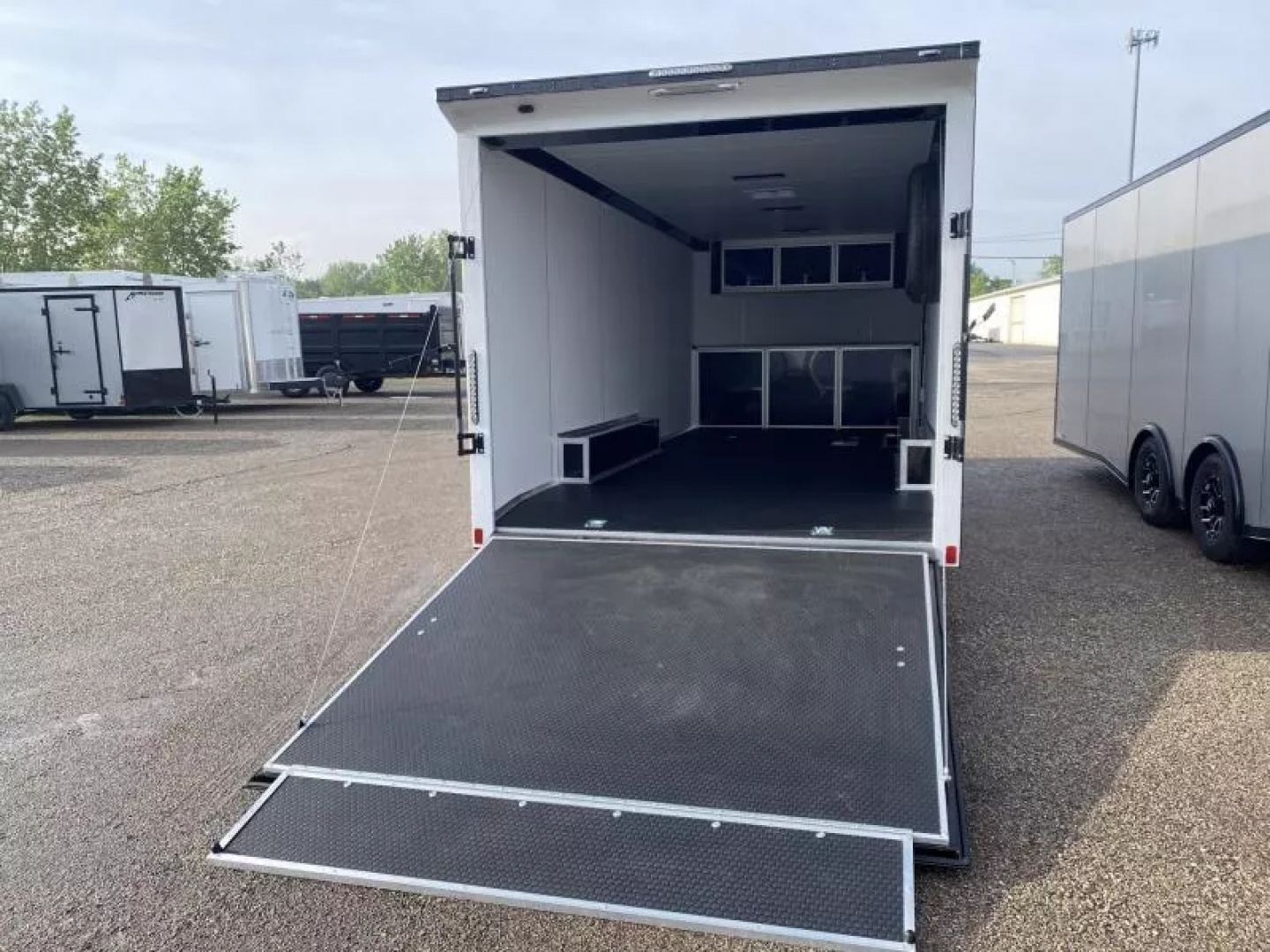 New 2025 Bravo Trailers 20 FT SCOUT PERFORMANCE ENCLOSED CAR HAULER WITH RAMP DOOR 10K GVWR *FACTORY CLOSE OUT AS IS*