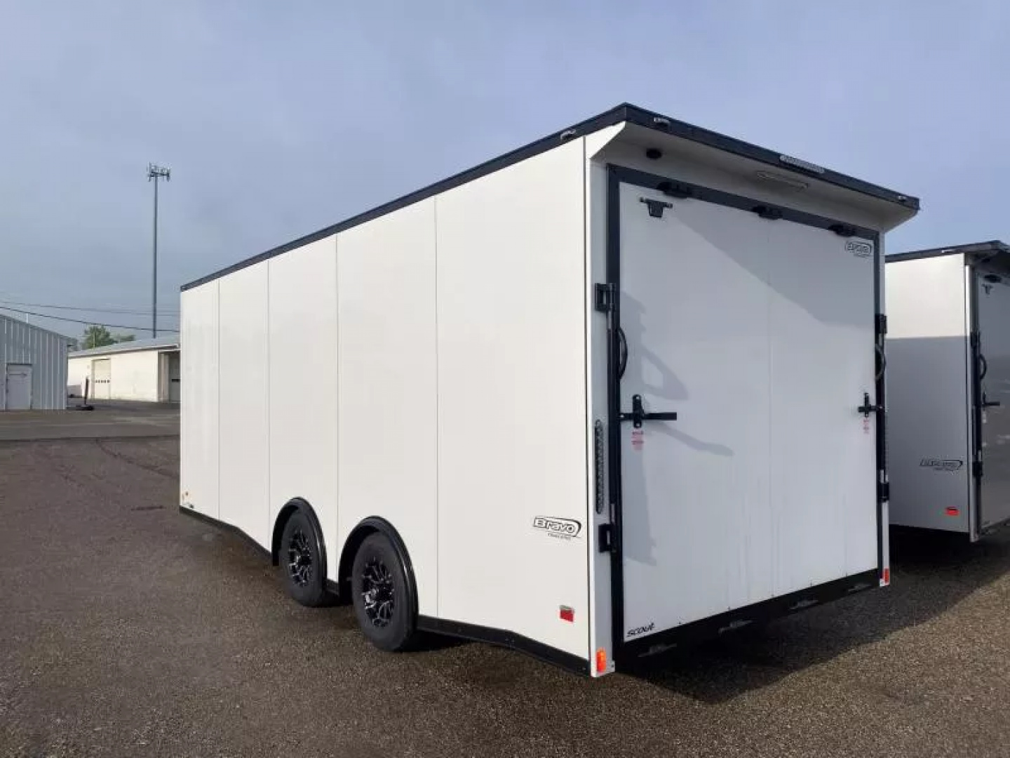 New 2025 Bravo Trailers 20 FT SCOUT PERFORMANCE ENCLOSED CAR HAULER WITH RAMP DOOR 10K GVWR *FACTORY CLOSE OUT AS IS*