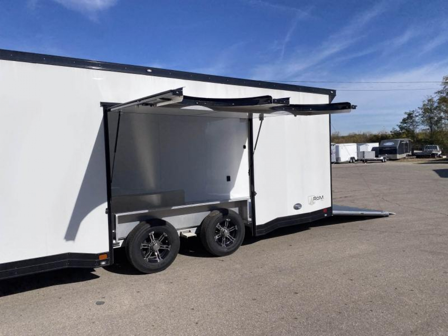 New 2023 ATC 24 FT ROM 500 ALUMINUM ENCLOSED RACE CAR HAULER WITH ESCAPE DOOR AND ALUMINUM FLOOR