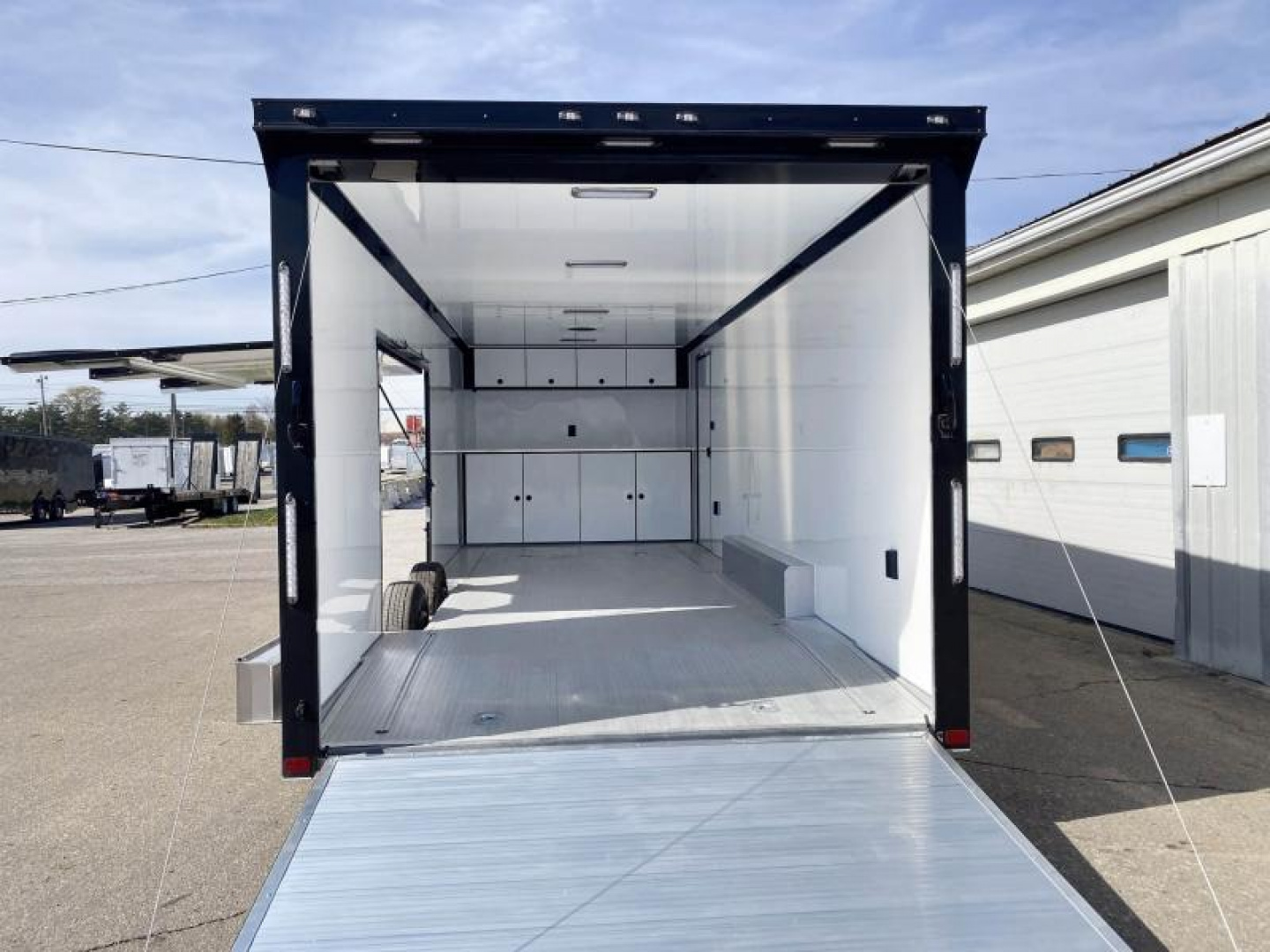 New 2023 ATC 24 FT ROM 500 ALUMINUM ENCLOSED RACE CAR HAULER WITH ESCAPE DOOR AND ALUMINUM FLOOR