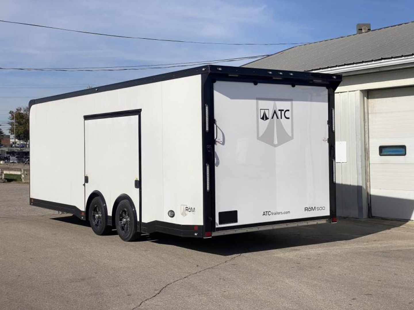 New 2023 ATC 24 FT ROM 500 ALUMINUM ENCLOSED RACE CAR HAULER WITH ESCAPE DOOR AND ALUMINUM FLOOR