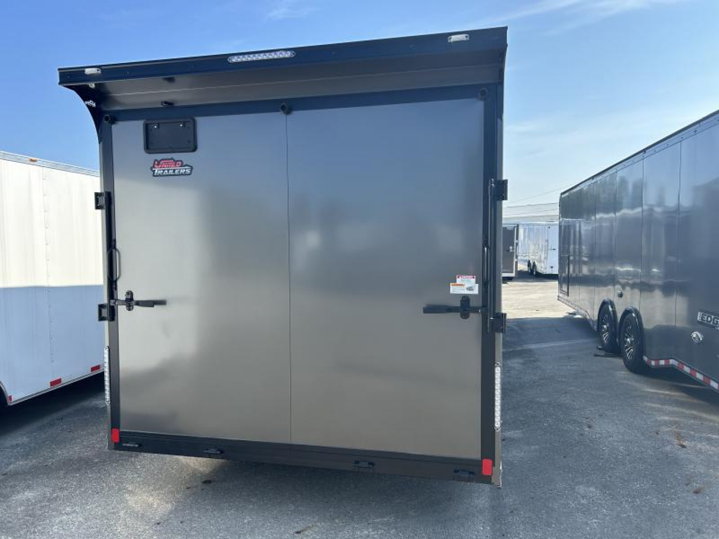 New 2024 United Trailers 24 FT ENCLOSED CAR HAULER TORSION AXLES  ALUMINUM WHEELS WITH BLACK OUT TRIM
