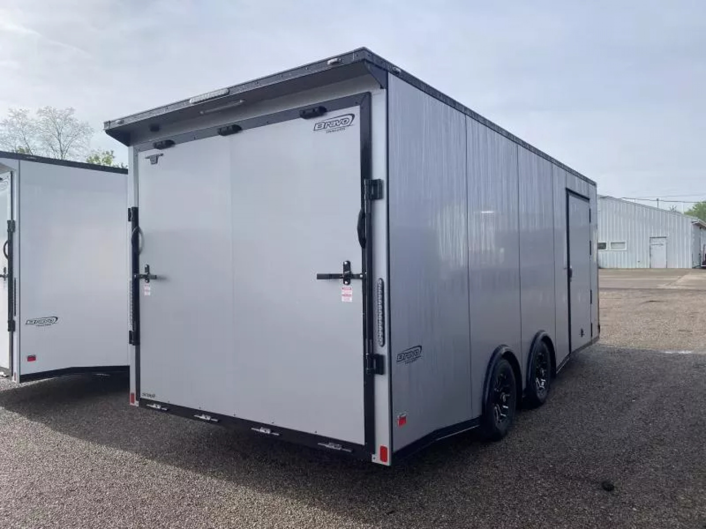 New 2025 Bravo Trailers 20 FT SCOUT PERFORMANCE ENCLOSED CAR HAULER WITH RAMP DOOR 10K GVWR *FACTORY CLOSE OUT*