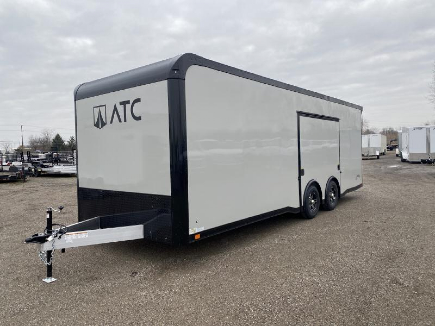 New 2023 ATC 24 FT ENCLOSED CAR HAULER 7 FT INT HEIGHT WITH ESCAPE DOOR AND BLACK OUT TRIM ROM 300