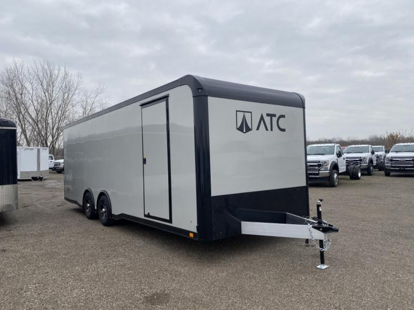 New 2023 ATC 24 FT ENCLOSED CAR HAULER 7 FT INT HEIGHT WITH ESCAPE DOOR AND BLACK OUT TRIM ROM 300