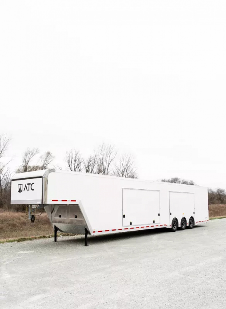New 2025 ATC GOOSENECK 48 FT ENCLOSED CAR HAULER 2 ESCAPE DOORS TRI-AXLE 25,000 GVWR