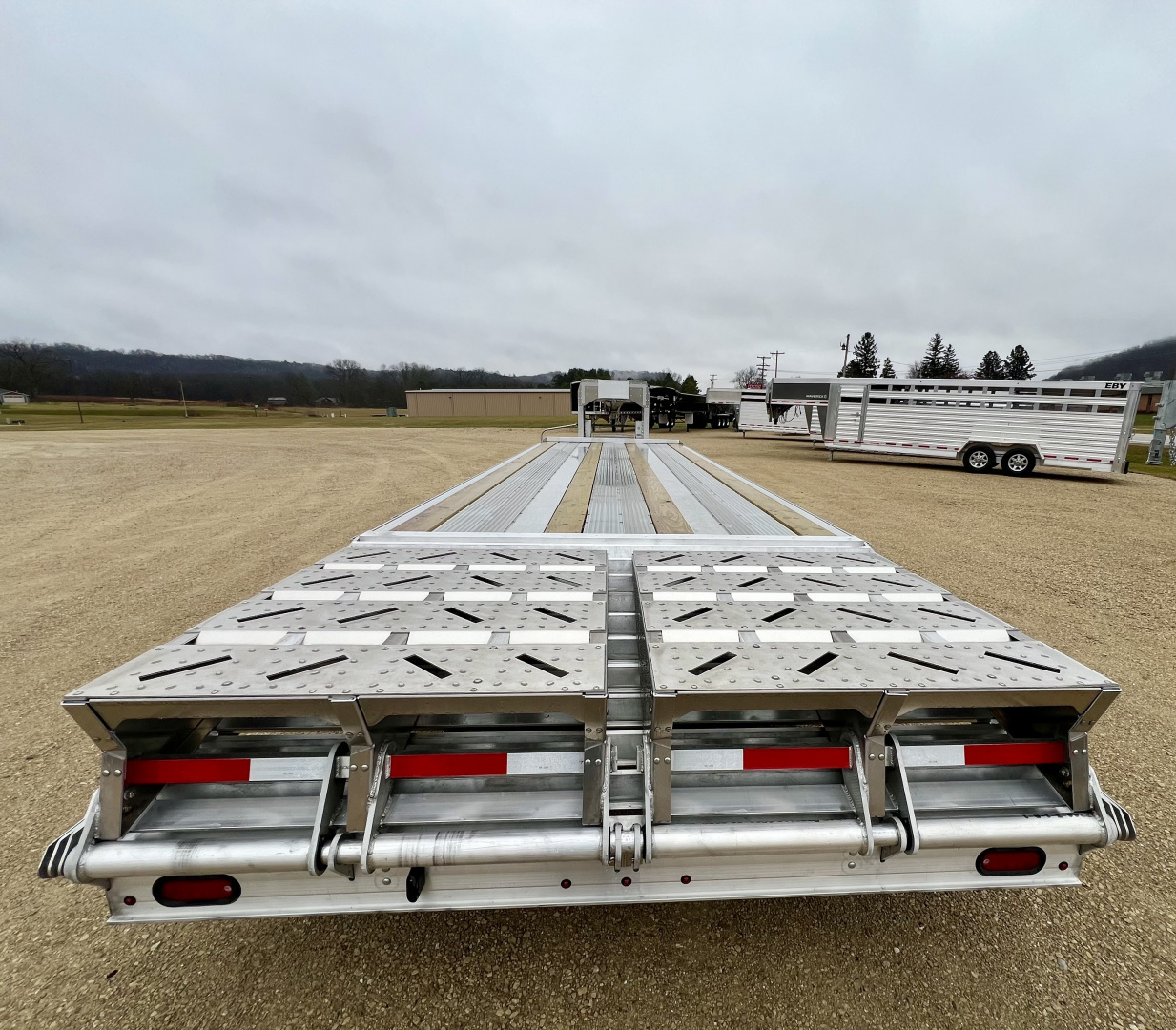 New 2025 EBY Trailers GN25K Flatbed Trailer