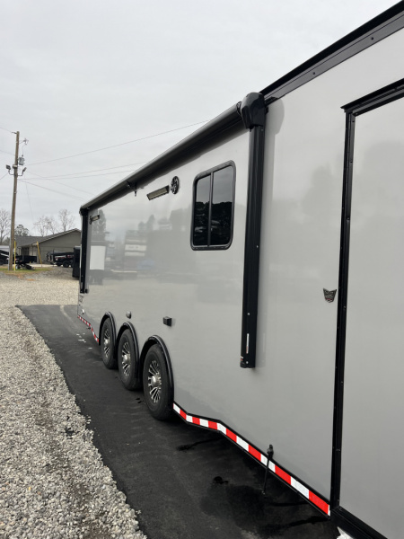 New 2026 Haulmark 34 Bathoom Race Trailer, Air Prep PKG, Awning, Polycor, Insulated, Window, 54" ALX Slide Out Step, A/C + Heat