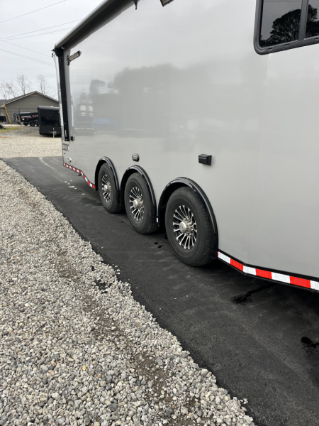 New 2026 Haulmark 34 Bathoom Race Trailer, Air Prep PKG, Awning, Polycor, Insulated, Window, 54" ALX Slide Out Step, A/C + Heat