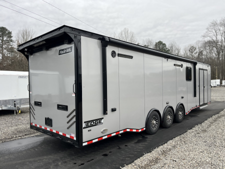 New 2026 Haulmark 34 Bathoom Race Trailer, Air Prep PKG, Awning, Polycor, Insulated, Window, 54" ALX Slide Out Step, A/C + Heat
