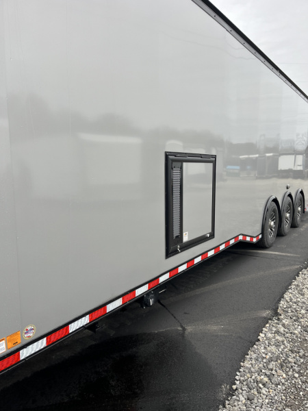 New 2026 Haulmark 34 Bathoom Race Trailer, Air Prep PKG, Awning, Polycor, Insulated, Window, 54" ALX Slide Out Step, A/C + Heat