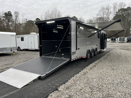 New 2026 Haulmark 34 Bathoom Race Trailer, Air Prep PKG, Awning, Polycor, Insulated, Window, 54" ALX Slide Out Step, A/C + Heat