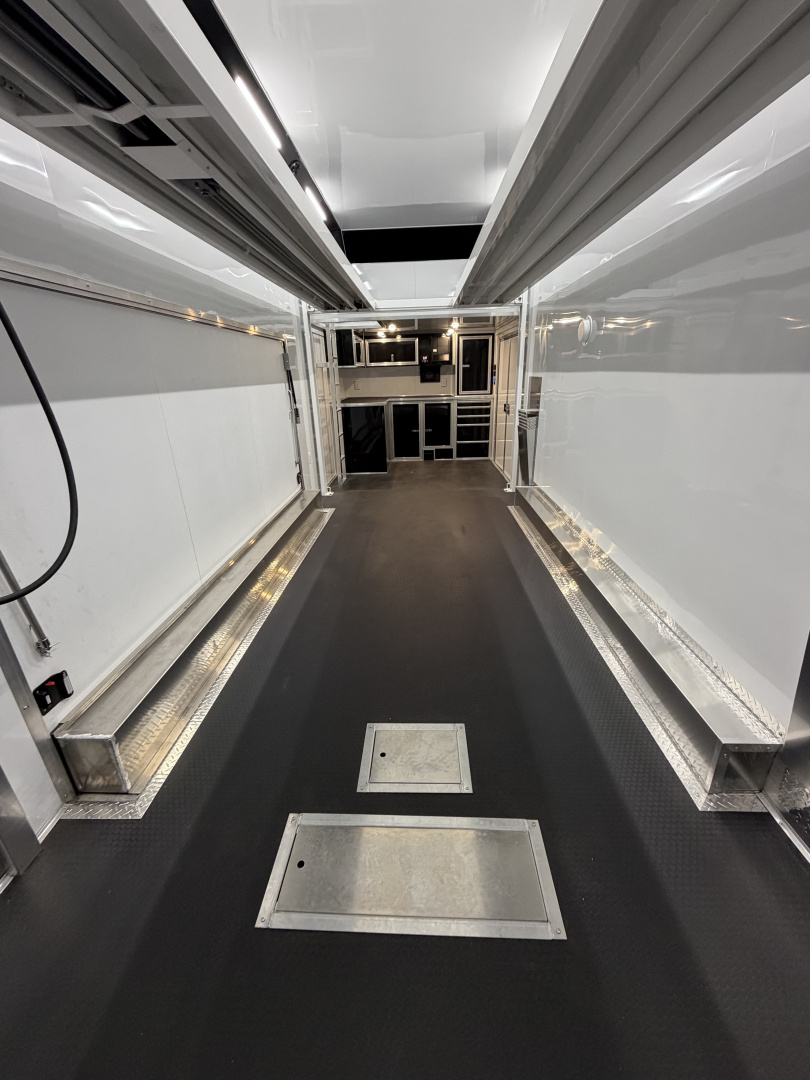 New 2026 Haulmark EDGE ALUMINUM 28 Stacker Race Trailer, Finished Race Interior, 21K GVWR, Awnings, Lift, Premium Escape Door