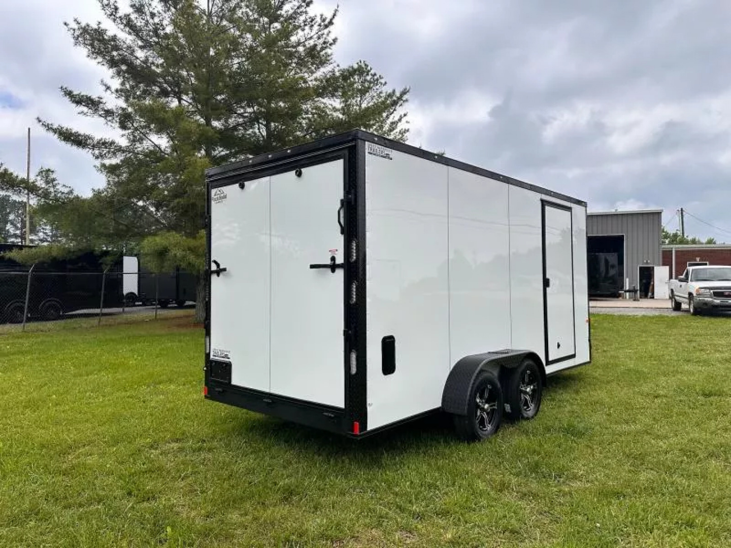 New 2025 Rock Solid Cargo 7X16 Enclosed Trailer-3500LB Tandem Axle-White Poly-Blackout