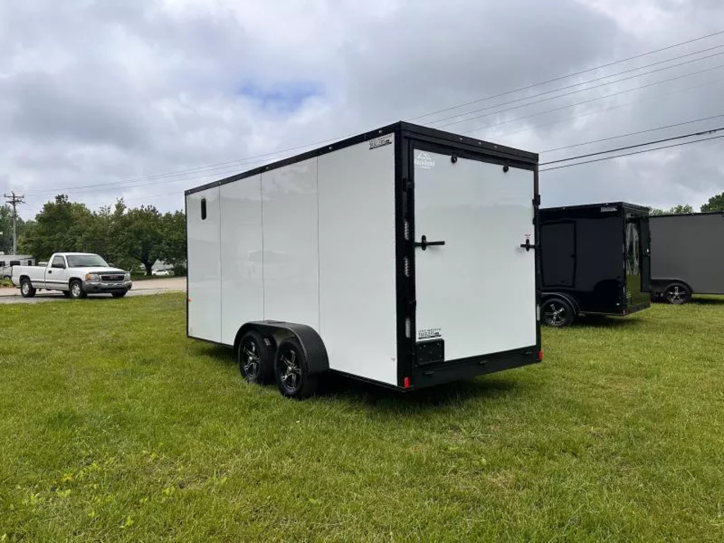 New 2025 Rock Solid Cargo 7X16 Enclosed Trailer-3500LB Tandem Axle-White Poly-Blackout