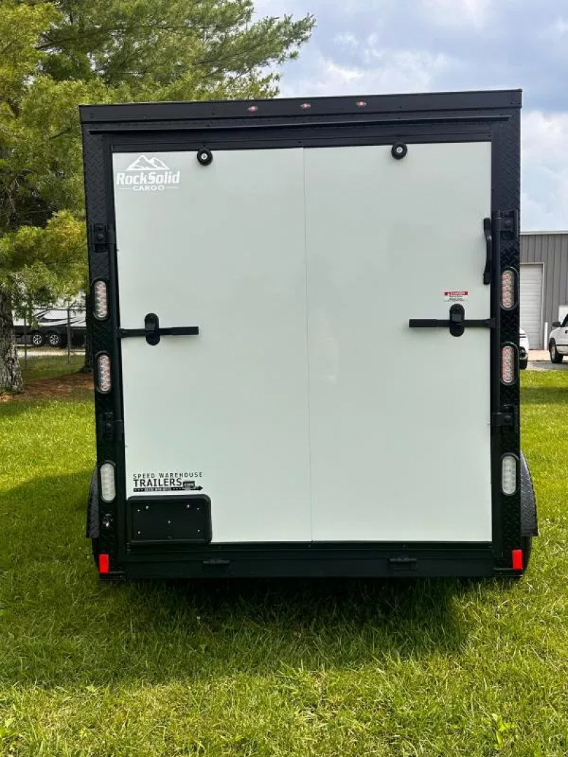 New 2025 Rock Solid Cargo 6X12 Enclosed Trailer- 3500LB Tandem Axle-White Poly- Blackout