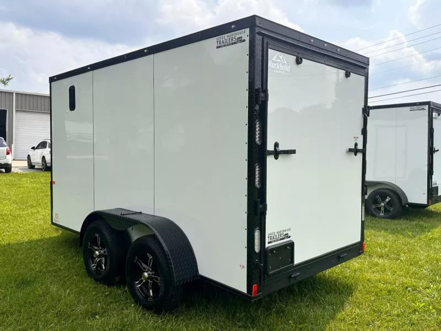 New 2025 Rock Solid Cargo 6X12 Enclosed Trailer- 3500LB Tandem Axle-White Poly- Blackout