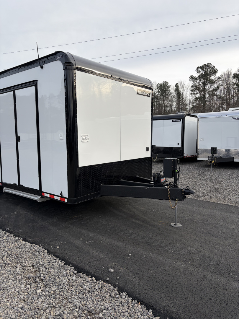 New 2026 Haulmark 34 Bathroom Race Trailer, Air Prep PKG, Awning, Polycor, Insulated, Window, 54" ALX Slide Out Step, A/C + Heat