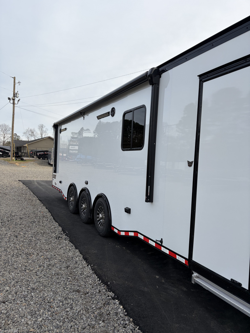 New 2026 Haulmark 34 Bathroom Race Trailer, Air Prep PKG, Awning, Polycor, Insulated, Window, 54" ALX Slide Out Step, A/C + Heat