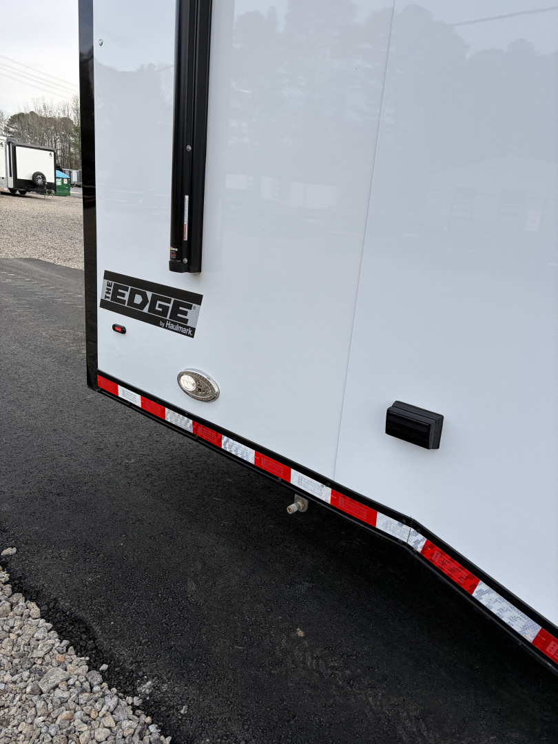 New 2026 Haulmark 34 Bathroom Race Trailer, Air Prep PKG, Awning, Polycor, Insulated, Window, 54" ALX Slide Out Step, A/C + Heat