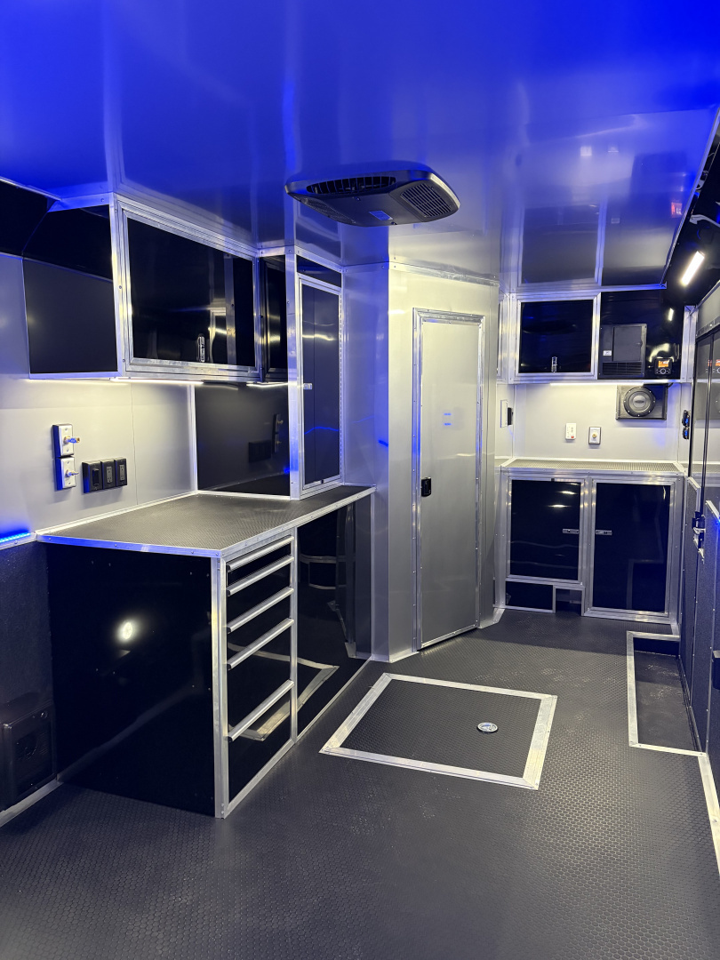 New 2026 Haulmark 34 Bathroom Race Trailer, Air Prep PKG, Awning, Polycor, Insulated, Window, 54" ALX Slide Out Step, A/C + Heat
