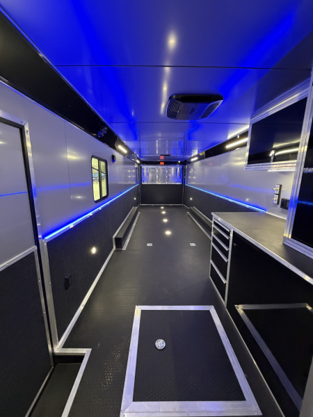 New 2026 Haulmark 34 Bathroom Race Trailer, Air Prep PKG, Awning, Polycor, Insulated, Window, 54" ALX Slide Out Step, A/C + Heat