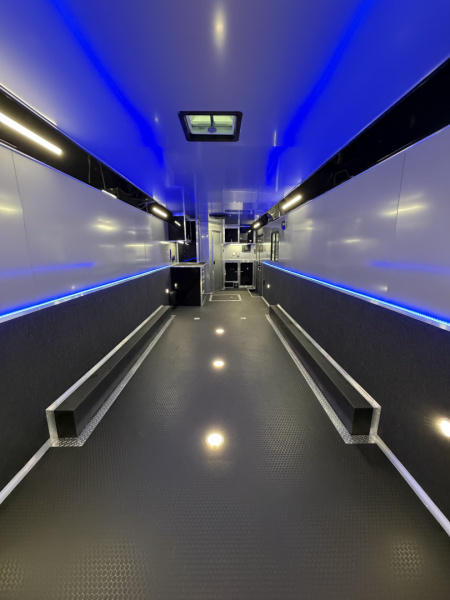 New 2026 Haulmark 34 Bathroom Race Trailer, Air Prep PKG, Awning, Polycor, Insulated, Window, 54" ALX Slide Out Step, A/C + Heat