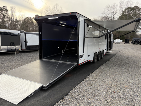 New 2026 Haulmark 34 Bathroom Race Trailer, Air Prep PKG, Awning, Polycor, Insulated, Window, 54" ALX Slide Out Step, A/C + Heat