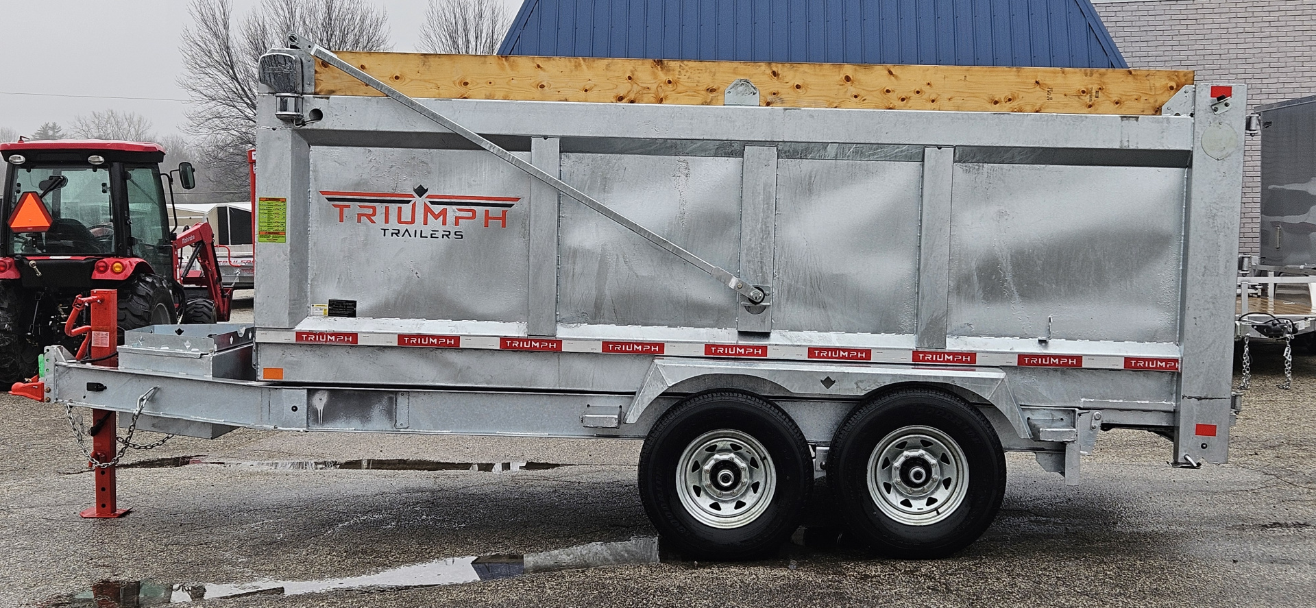 New 82" X 14' GALVANIZED DUMP 7 K AXLES 58" SIDES W/ WOOD RAMP & TARP INCLUDED 2026 TRIUMPH