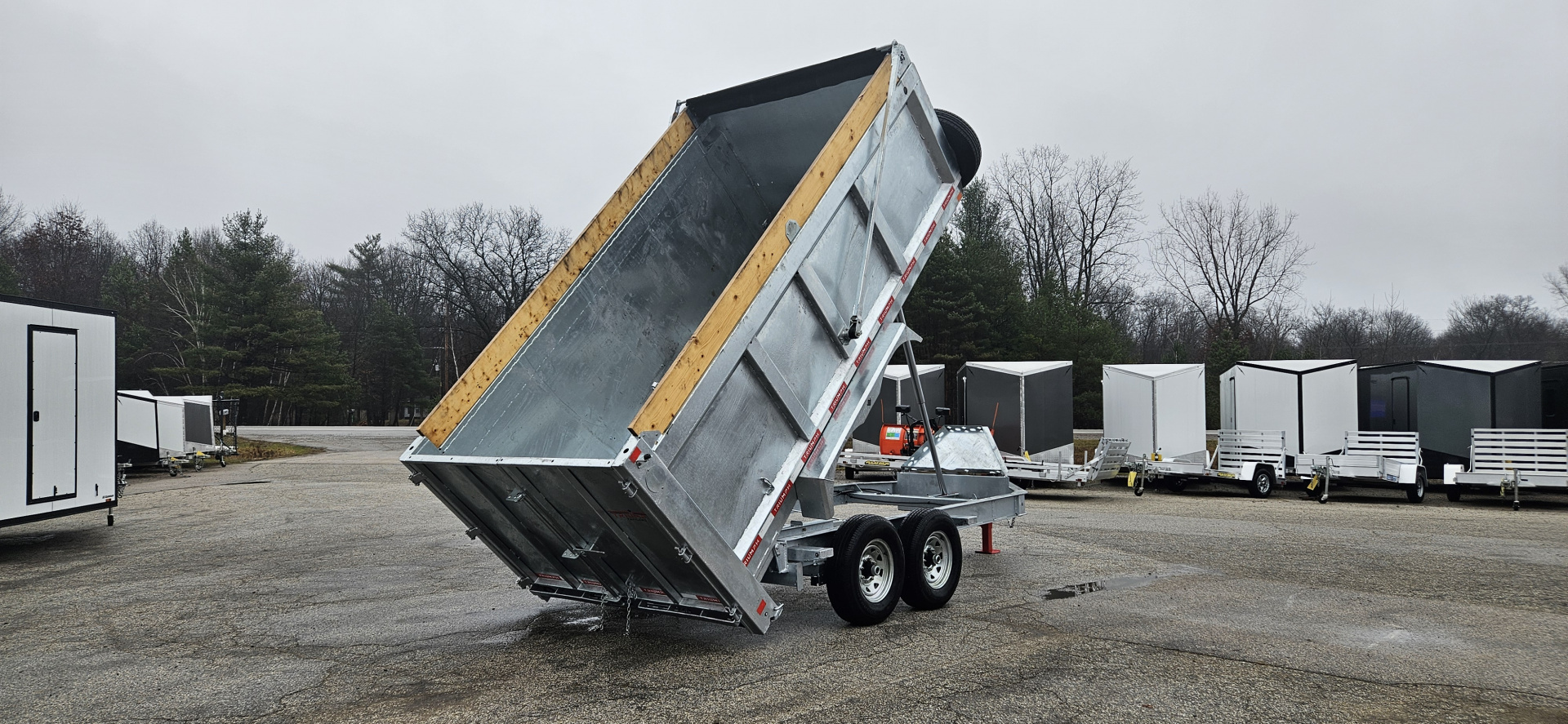 New 82" X 14' GALVANIZED DUMP 7 K AXLES 58" SIDES W/ WOOD RAMP & TARP INCLUDED 2026 TRIUMPH