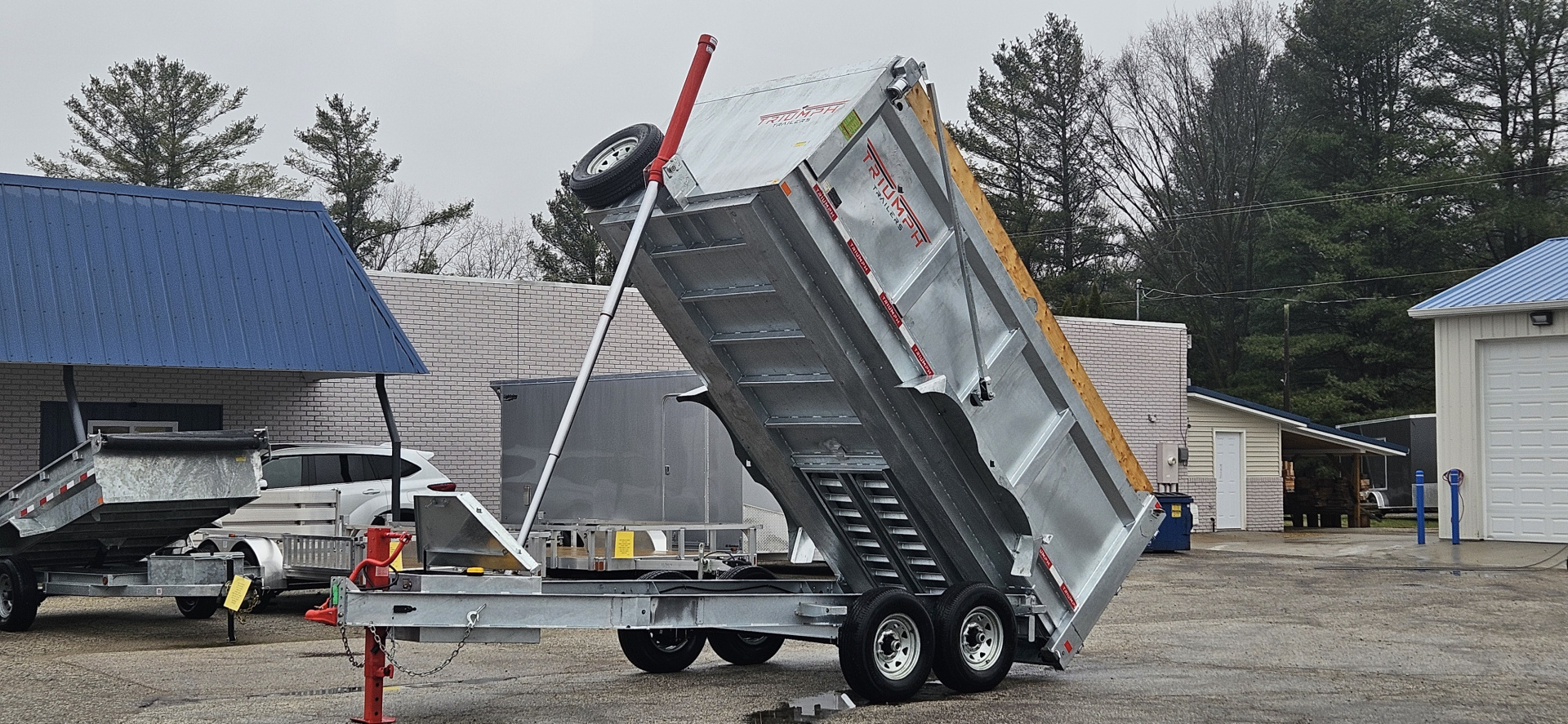 New 82" X 14' GALVANIZED DUMP 7 K AXLES 58" SIDES W/ WOOD RAMP & TARP INCLUDED 2026 TRIUMPH