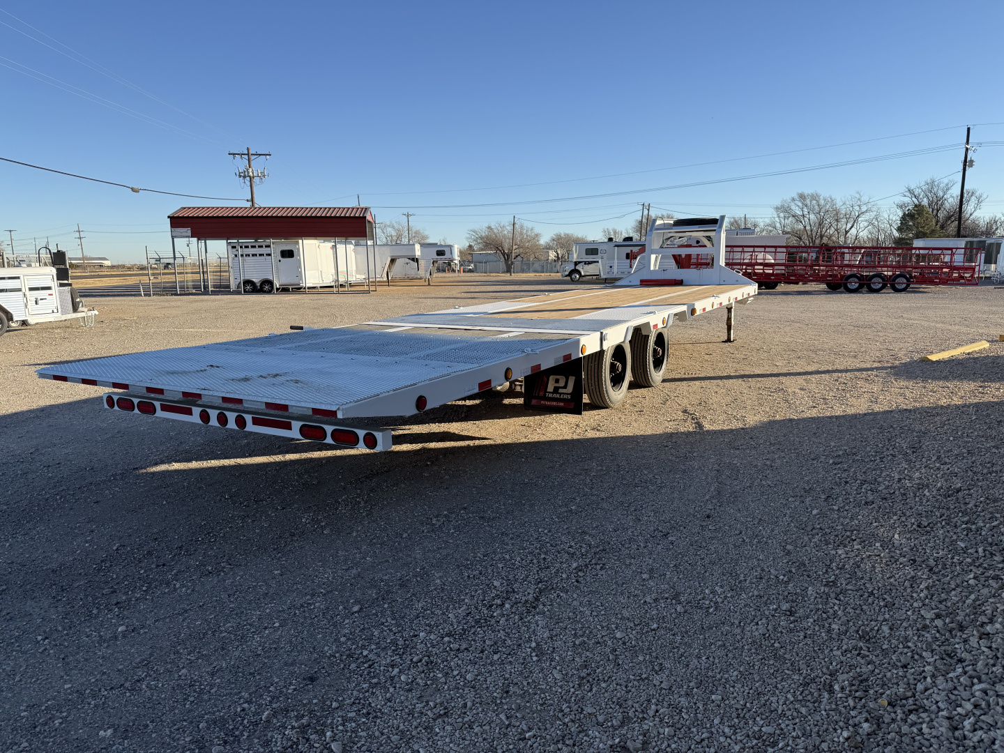 Used 2023 PJ Trailers HYDRUALIC DOVETAIL FLATBED