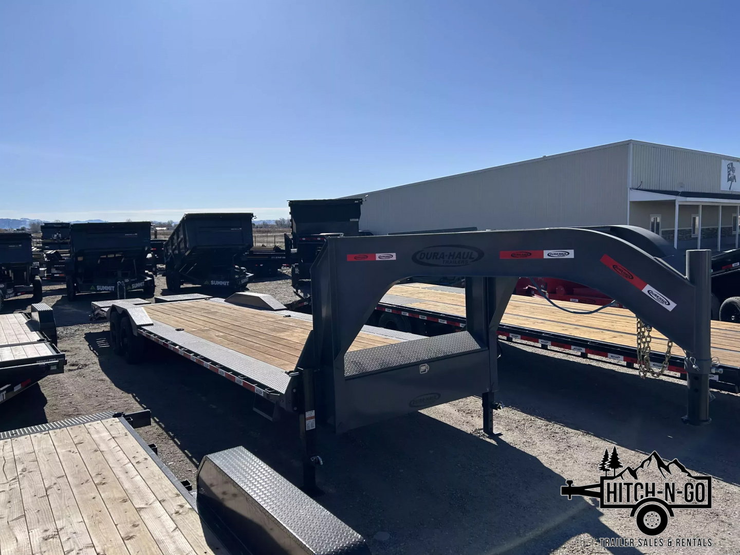 New 2025 Dura-Haul 8x28+4 20k Gooseneck Flatbed Equipment Trailer with Drive Over Fenders