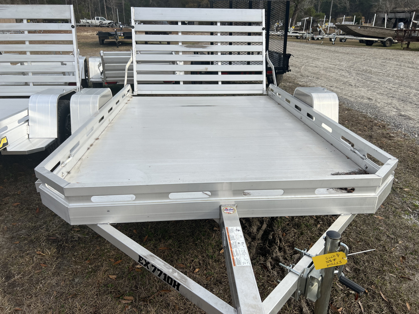 New 2025 Aluma EX7710H Utility Trailer
