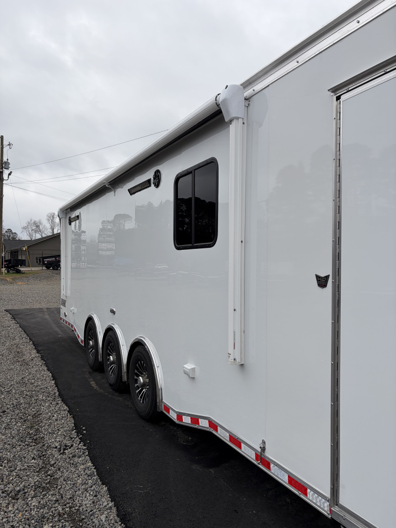 New 2026 Haulmark 34 Bathoom Race Trailer, Air Prep PKG, Awning, Polycor, Insulated, Window, 54" ALX Slide Out Step, A/C + Heat