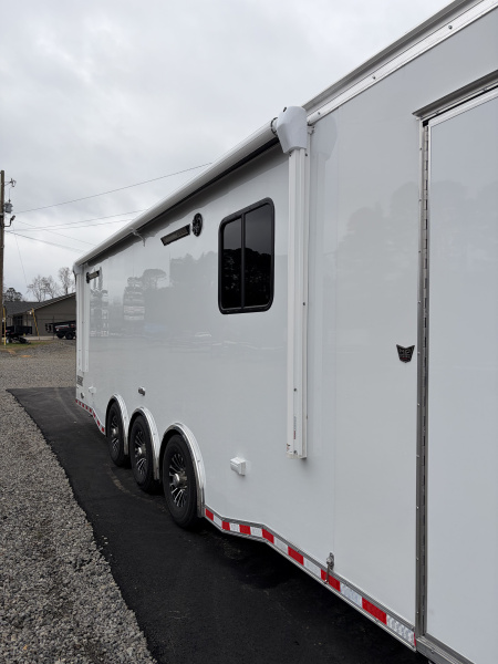 New 2026 Haulmark 34 Bathoom Race Trailer, Air Prep PKG, Awning, Polycor, Insulated, Window, 54" ALX Slide Out Step, A/C + Heat