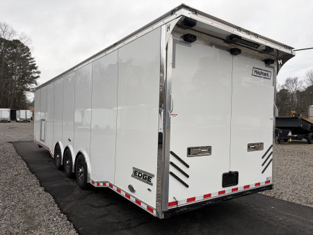 New 2026 Haulmark 34 Bathoom Race Trailer, Air Prep PKG, Awning, Polycor, Insulated, Window, 54" ALX Slide Out Step, A/C + Heat