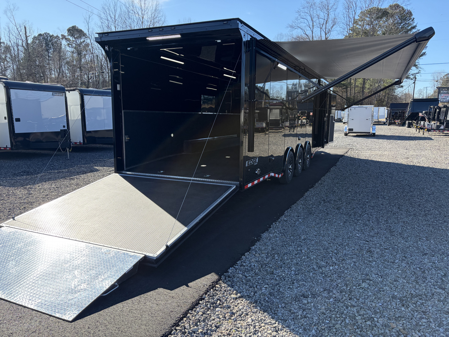 New 2026 Haulmark EDGE 34 Race Trailer With Turbo Package, Awning, Polycor, Insulated, Black Trim Package